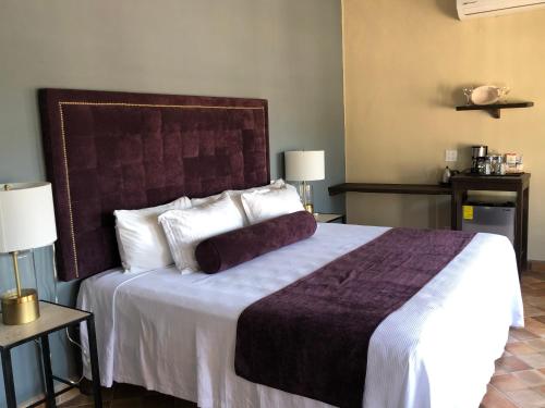 Hotel 1697 Loretoにあるベッド