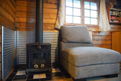 Ein Sitzbereich in der Unterkunft Arngrimslundur log cabin - cabin 3