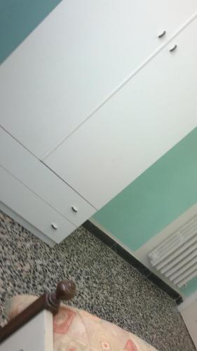 a white ceiling in a room with a floor at B&B In Centro in San Benedetto del Tronto