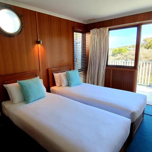 Ένα ή περισσότερα κρεβάτια σε δωμάτιο στο Point Lonsdale Guest House