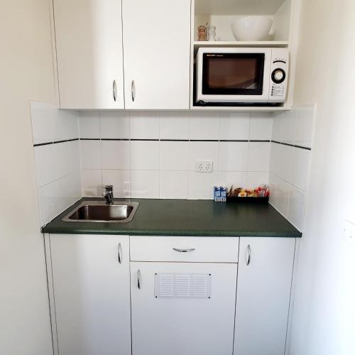 Η κουζίνα ή μικρή κουζίνα στο Point Lonsdale Guest House