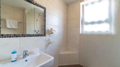 Koupelna v ubytování Hotel Lutter