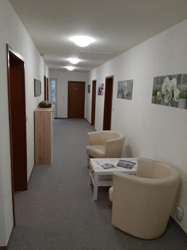 Ein Sitzbereich in der Unterkunft Hotel Garni La mer