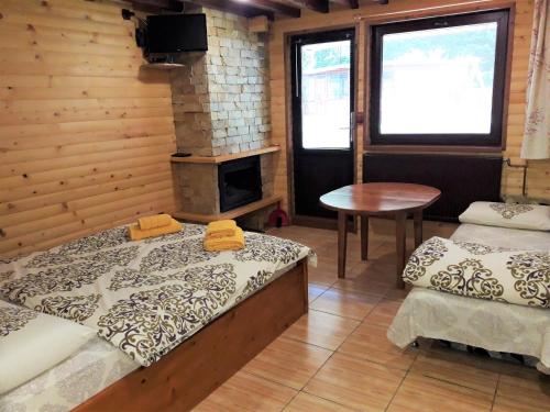 Krevet ili kreveti u jedinici u okviru objekta Guest House Chobaka