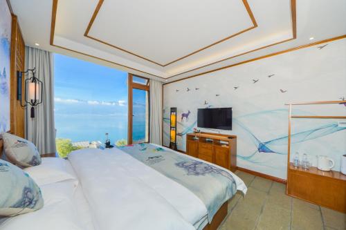 TV a/nebo společenská místnost v ubytování Dali Dare Sea View Gueshouse