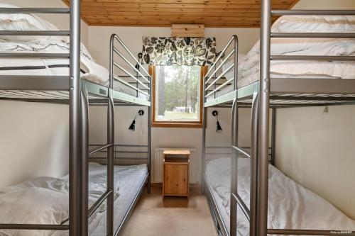 Postel nebo postele na pokoji v ubytování First Camp Mellsta-Borlänge