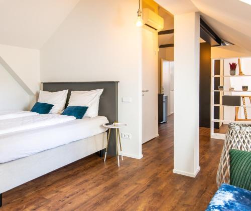 Postel nebo postele na pokoji v ubytování Luxstay Bad Nauheim - Self-Check-In