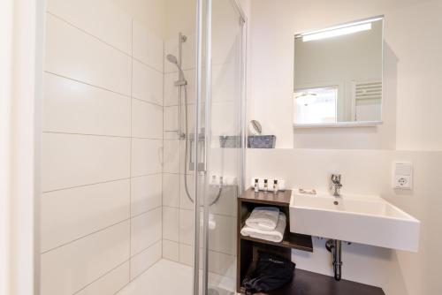 Ett badrum på Luxstay Bad Nauheim - Self-Check-In