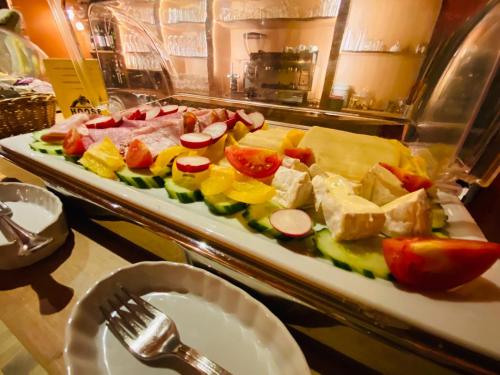a platter of food on a buffet table at Landhaus Hammoor Stieper Gastronomie GmbH in Hammoor