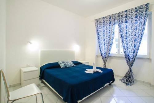 Ένα ή περισσότερα κρεβάτια σε δωμάτιο στο Casa Vacanze Maiori
