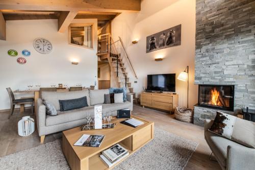 Televisyen dan/atau pusat hiburan di Mammoth Lodge by Alpine Resorts