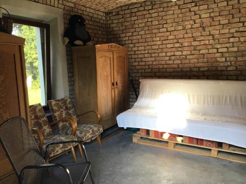 Postel nebo postele na pokoji v ubytování chata Dětřichov nad Bystřicí