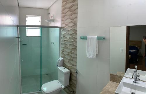 Um banheiro em Hotel Aliança Barbacena