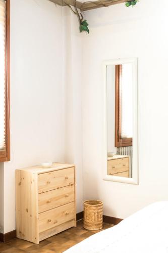 Postel nebo postele na pokoji v ubytování B&B Murolungo