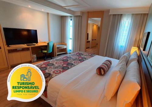 Televisyen dan/atau pusat hiburan di Lets Idea Brasília Hotel