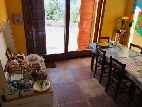 Kuchyň nebo kuchyňský kout v ubytování Green B&B Urbino Cá del vento