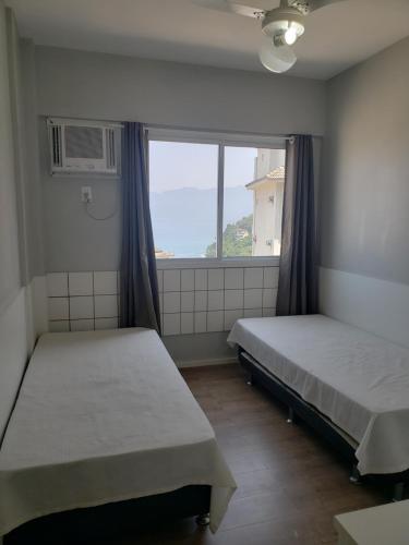 Postel nebo postele na pokoji v ubytování Porto Real Resort Apartmento