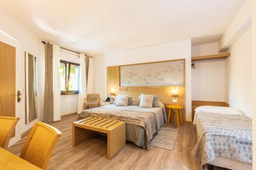 A bed or beds in a room at Costa Dorada