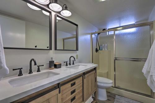 a bathroom with a sink and a toilet and a shower at Deck, Games and Fire Pit Modern Pine Cabin! in Pine