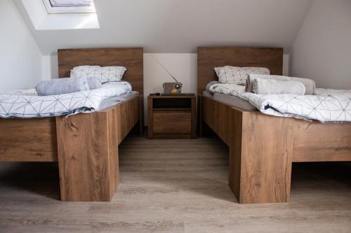 מיטה או מיטות בחדר ב-Turistična kmetija Sirk