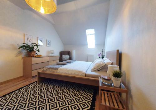 Postel nebo postele na pokoji v ubytování Apartmán Tatry & Resort