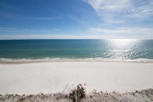 an empty beach with the ocean in the background at Windemere Condominiums in Perdido Key