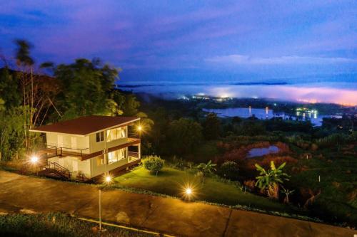 a house with a view of the city at night at The private 2 @ khao kho in Khao Kho