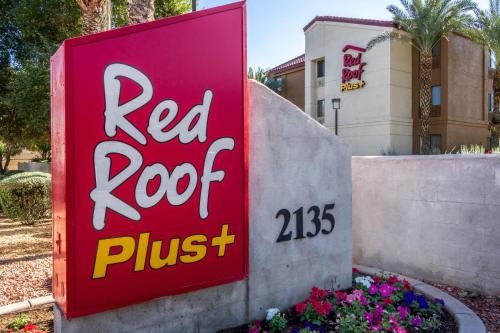 a red roof plus sign in front of a building at Red Roof Inn PLUS+ Tempe - Phoenix Airport in Tempe
