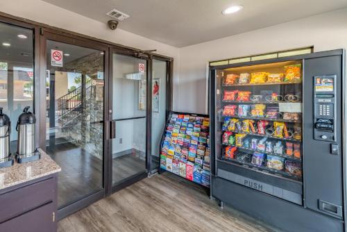 a grocery store with a refrigerator filled with food at Red Roof Inn Dallas - Mesquite Fair Park NE in Mesquite