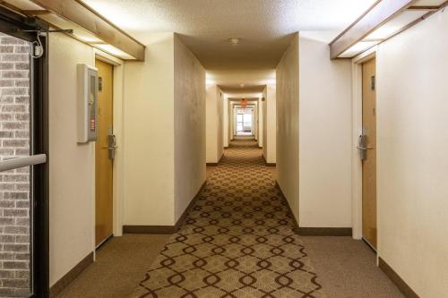 a corridor of a hospital hallway with a long corridor at Red Roof Inn Hardeeville in Hardeeville