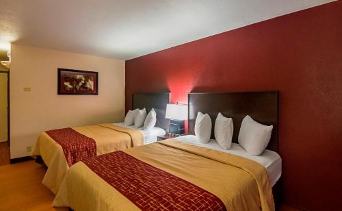 Ένα ή περισσότερα κρεβάτια σε δωμάτιο στο Red Roof Inn Lubbock