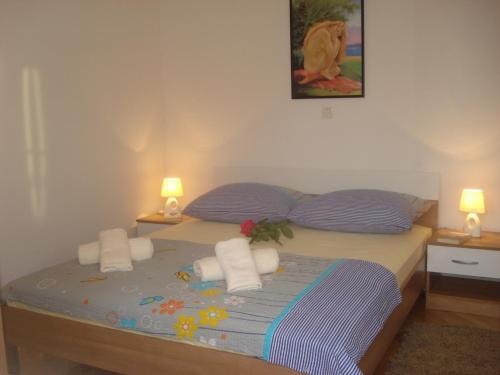 Krevet ili kreveti u jedinici u objektu Apartments Dalmacija