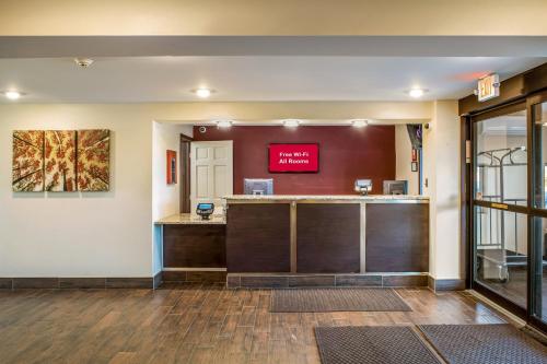 a lobby with a reception desk in a building at Red Roof Inn Richmond, IN in Richmond