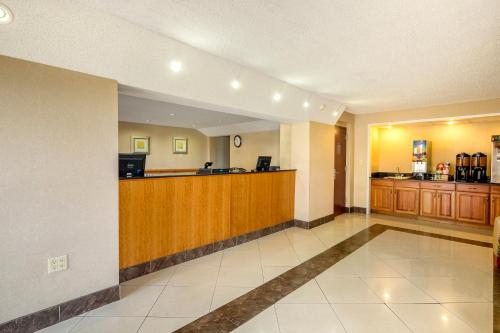 a lobby of a hotel with a reception desk at Red Roof Inn Virginia Beach-Norfolk Airport in Virginia Beach