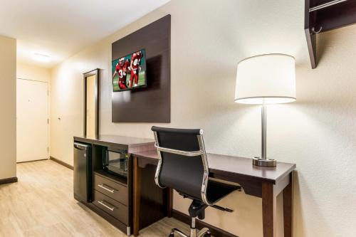 an office with a desk with a lamp and a chair at Red Roof Inn Dry Ridge in Dry Ridge