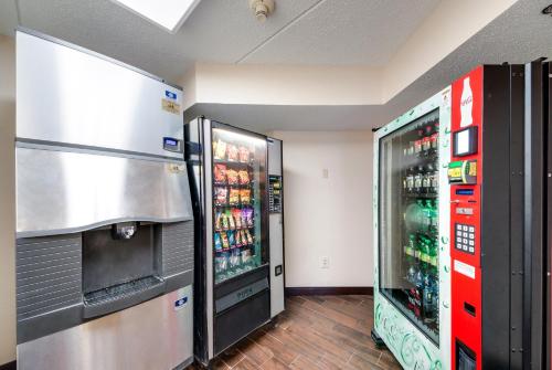 two large refrigerators in a room with drinks at Red Roof Inn Laredo in Laredo