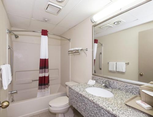 A bathroom at Red Roof Inn Hartford - Vernon