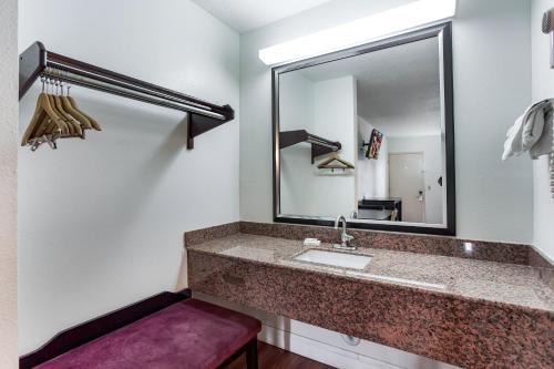 a bathroom with a sink and a mirror at Red Roof Inn Monteagle - I-24 in Monteagle