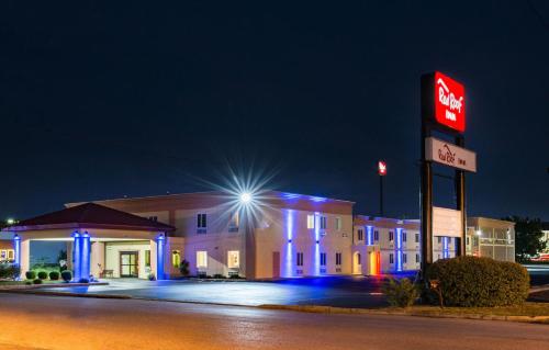 a mobil gas station with a sign in front of it at Red Roof Inn Chambersburg in Chambersburg