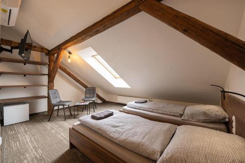Postel nebo postele na pokoji v ubytování Apartsee Wellness Plzeň