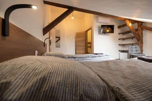 Ένα ή περισσότερα κρεβάτια σε δωμάτιο στο Apartsee Wellness Plzeň