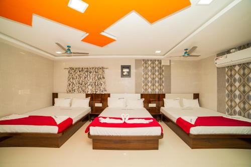 Voodi või voodid majutusasutuse Akash Residency toas