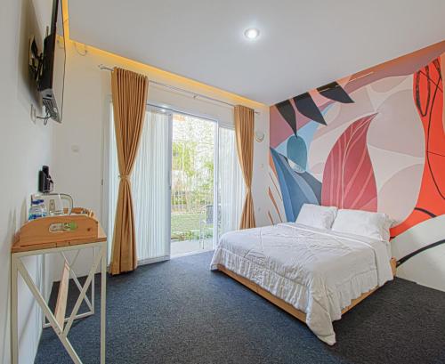 Postel nebo postele na pokoji v ubytování D'Journey Hotel