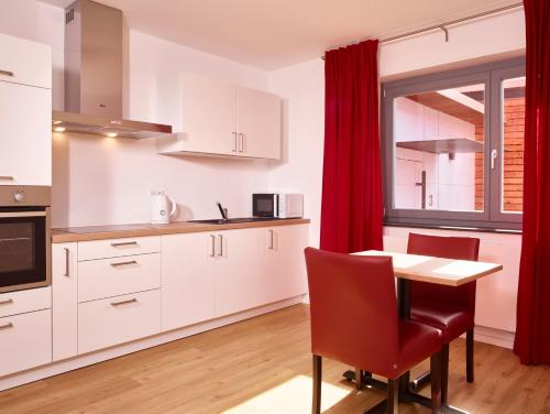 Φωτογραφία από το άλμπουμ του Luxusapartment Burgschänke στο Καϊζερσλάουτερν