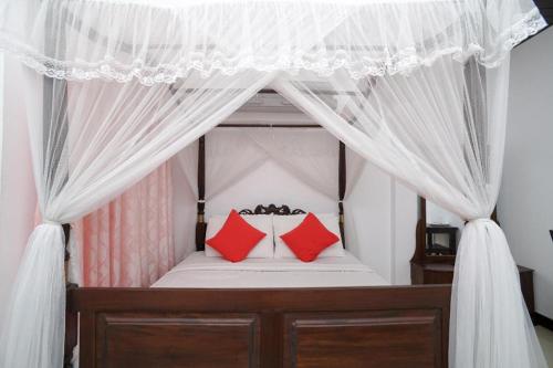 Katil atau katil-katil dalam bilik di Shirantha Hotel