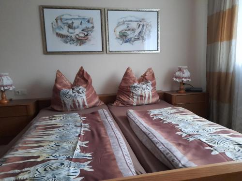 Ένα ή περισσότερα κρεβάτια σε δωμάτιο στο Trollenhof