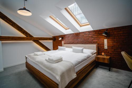 מיטה או מיטות בחדר ב-Garni Hotel DOCK Bratislava