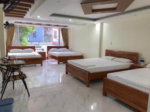 Giường trong phòng chung tại 89 Hotel