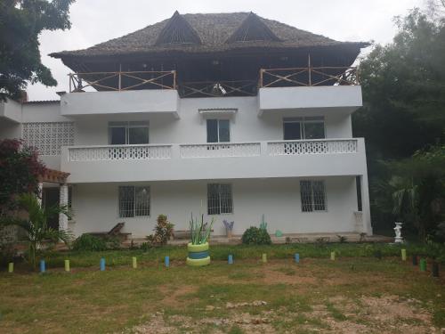 Zahrada ubytování Karibuni palace mtwapa