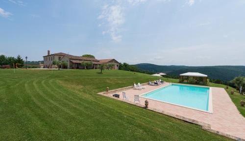 an aerial view of a house with a swimming pool at Villa Sofia - Homelike Villas in Amelia